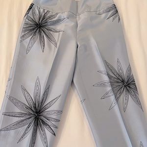 Silk, lined pants with side zipper. Dry clean only.